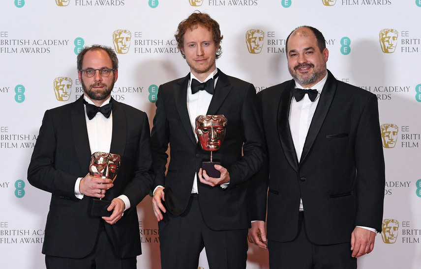 Nemes Jeles László rendező, valamint Sipos Gábor és Rajna Gábor producerek a BAFTA-díjkiosztón 
