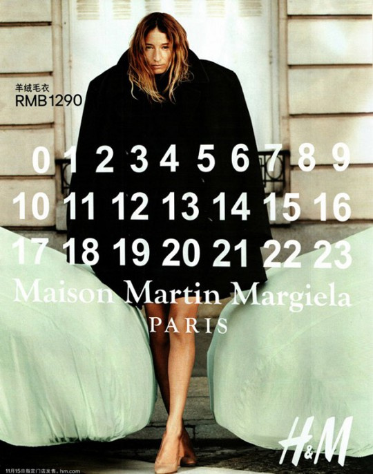 Fekete Maison MArtin Margiela kabát 44.900 forint a H&M-ben.