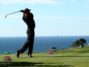 Obama Tiger Woodsszal golfozott