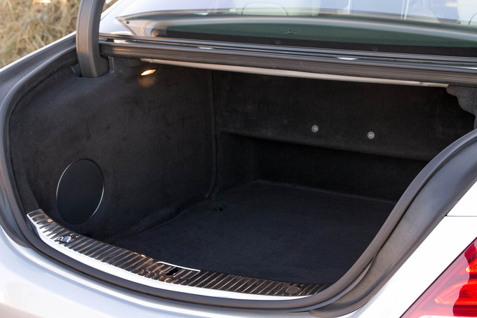 Trunk, truncated: subwoofer on the left, power seat mechanism in the back