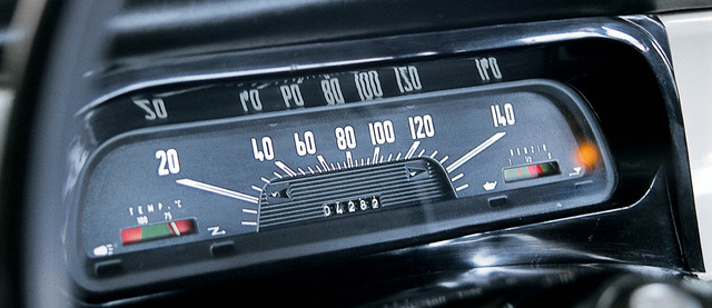 Horizontal speedometers were fashionable those days. There is also a water thermometer and a fuel gauge