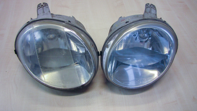 Matiz headlamps. The one on the right has been polished out. The middle section of the left-side lamp shows the way both headlights used to be
