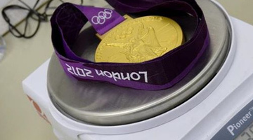 Mennyit nyom egy olimpiai arany?