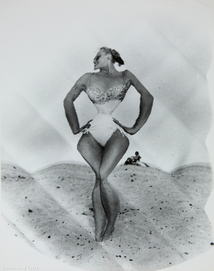 Grace Kelly fürdőruha-bemutatója egy New York-i strandon, 1958-ban.  Weegee úgy tekintett a kamerára, mint korunk csodalámpája: csak megnyomjuk a gombot, és miénk lesz minden, amit akarunk.